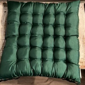 Dress up any table with these beautiful tufted silk chair cushions.